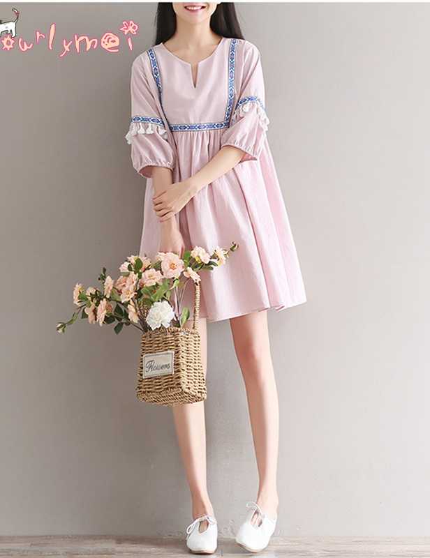 robe empire à broderies